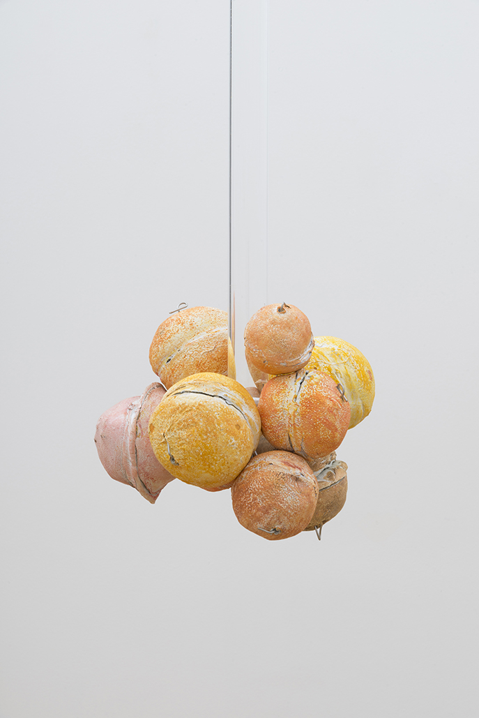 Untitled (Citrus Balls 4) Solid cast acrylic rod, various citrus fruit rinds, epoxy putty, oil pastel, stainless steel wire, and enamel; dimensions variable; 2018